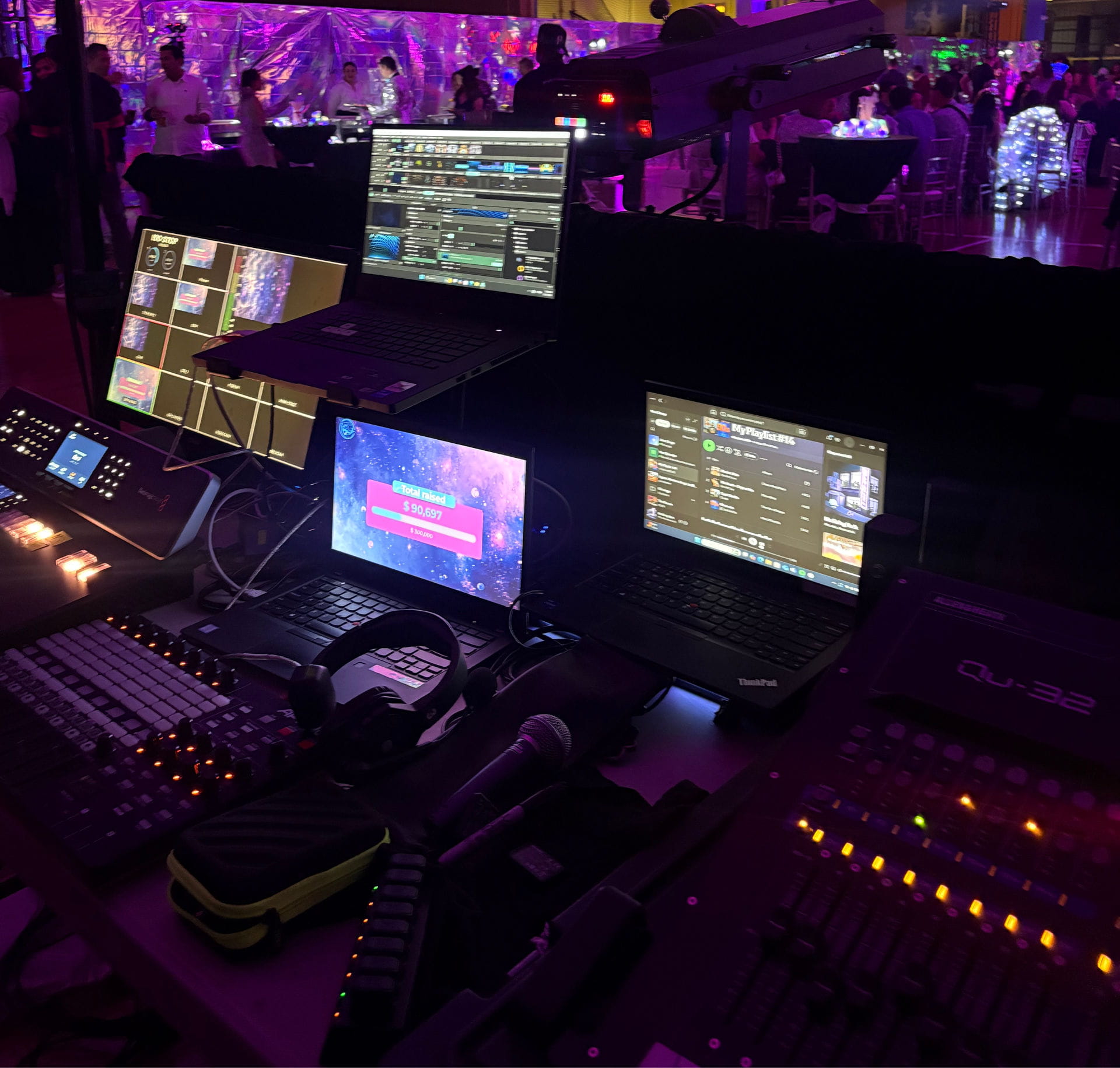 Spacious hotel exhibition and networking hall arranged with professional lighting and digital displays for a multi-day conference.